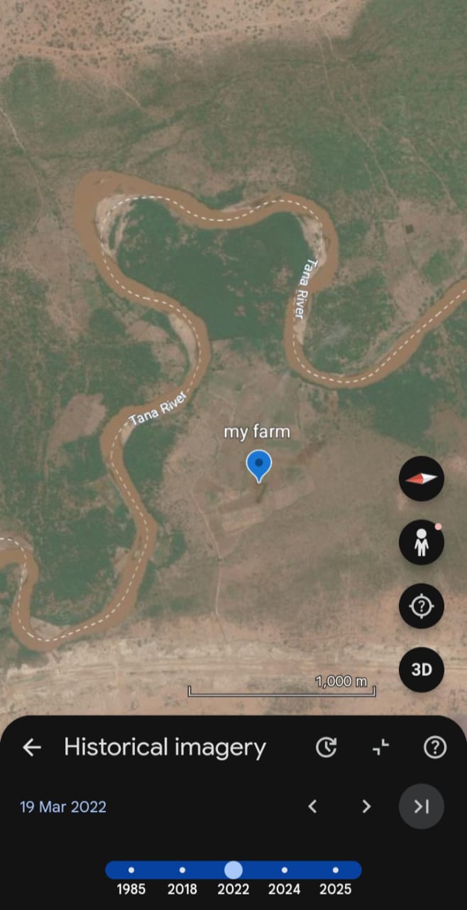 His family farm stretching to the riverbank before the flood